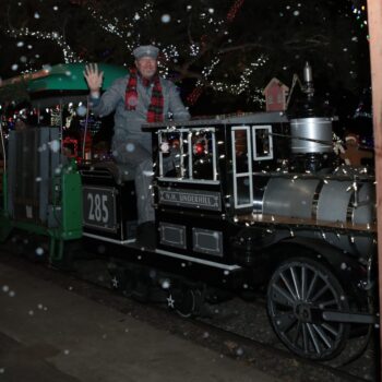 Conductor on Christmas Train Waving